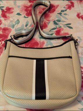 Haute Shore Beige and  Black Neoprene Crossbody Bag